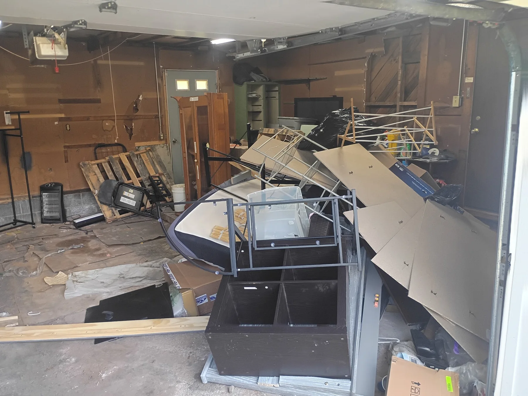 Garage before a Pioneer Valley Junk Removal cleanout