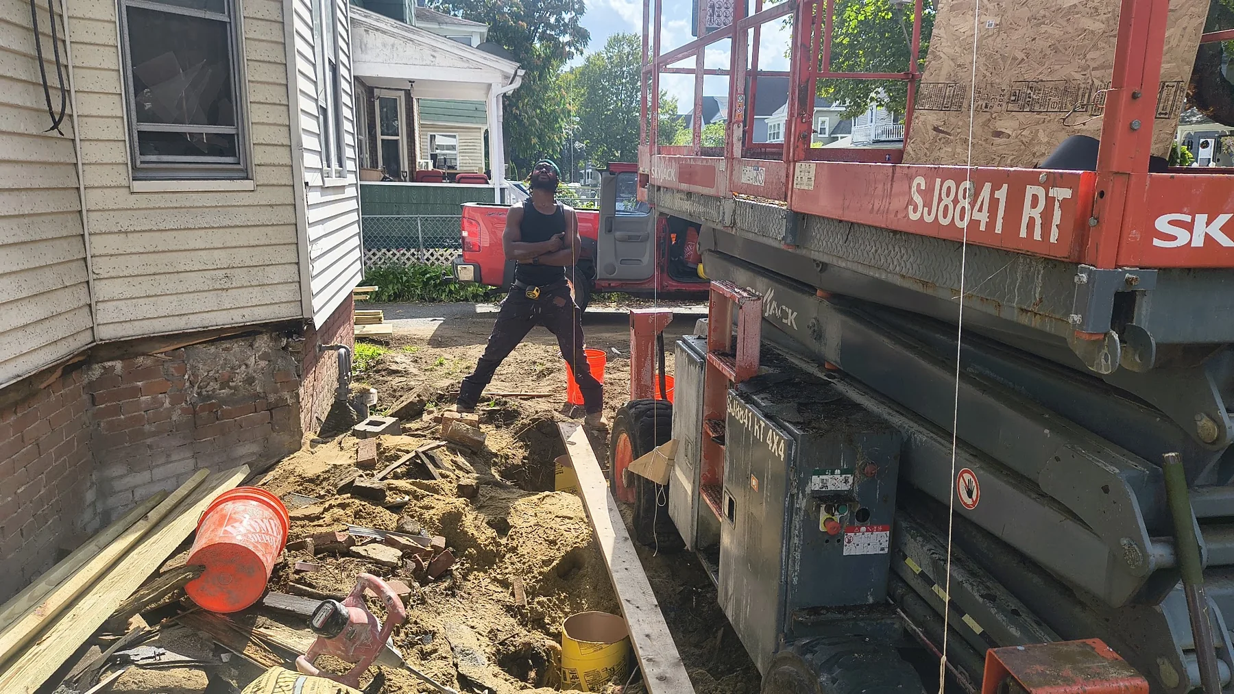 Pioneer Valley Junk Removal truck collecting construction debris